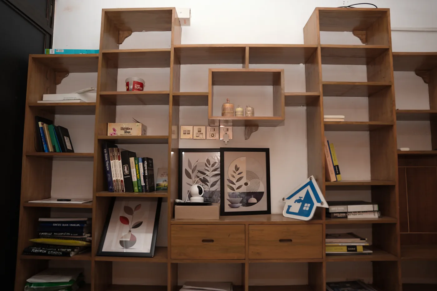 The Zesterex sign on the studio shelving