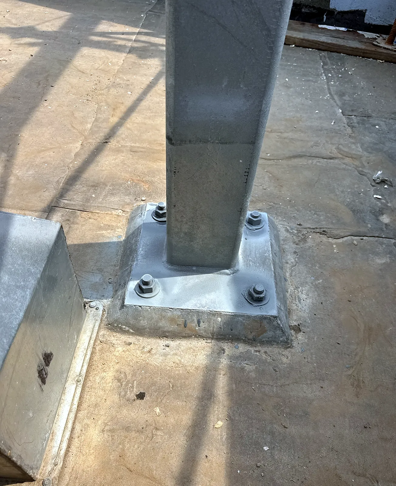 Steel column on a bolted base plate